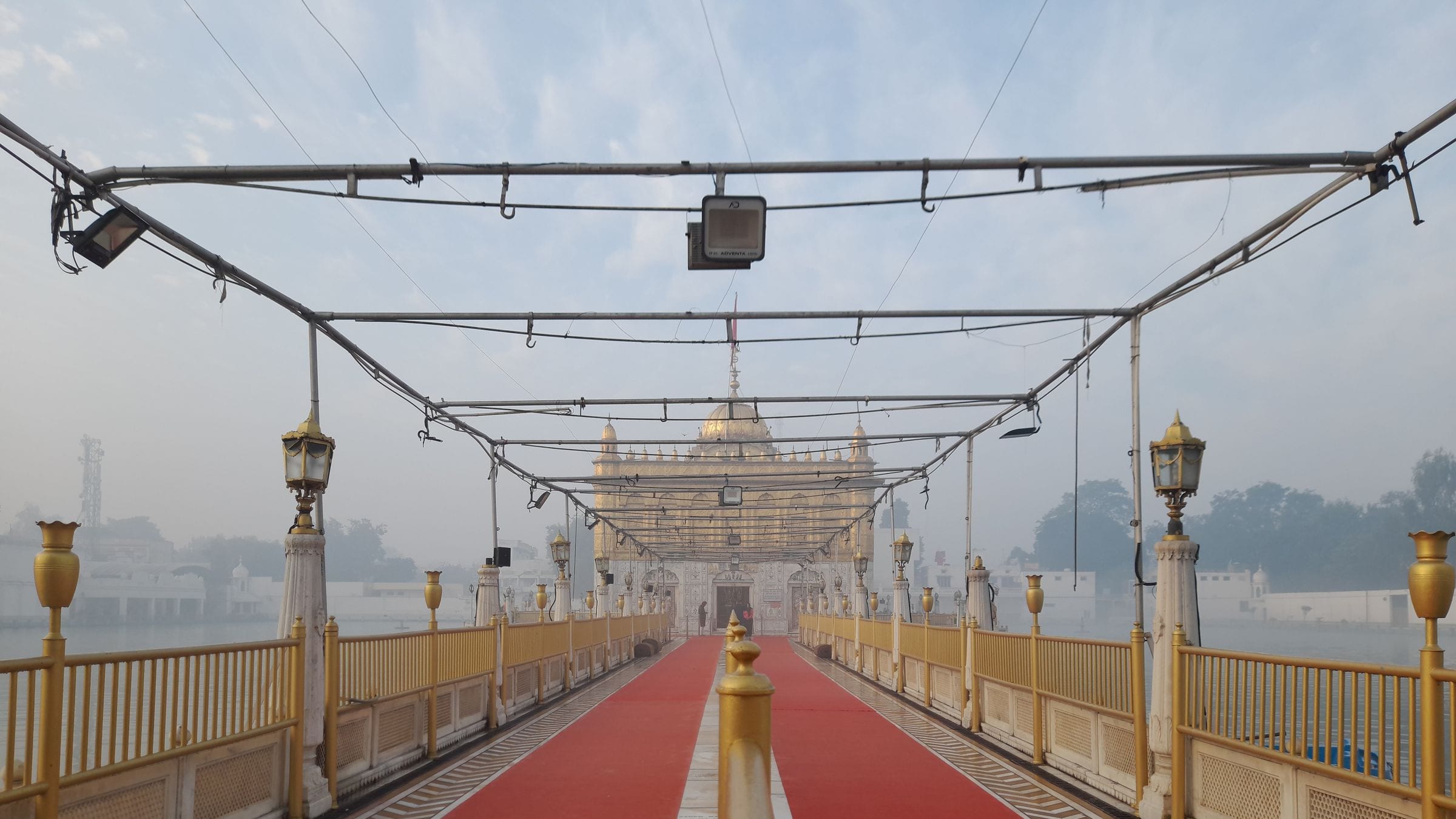 Golden Temple reflected in the sarovar at dawn, Amritsar